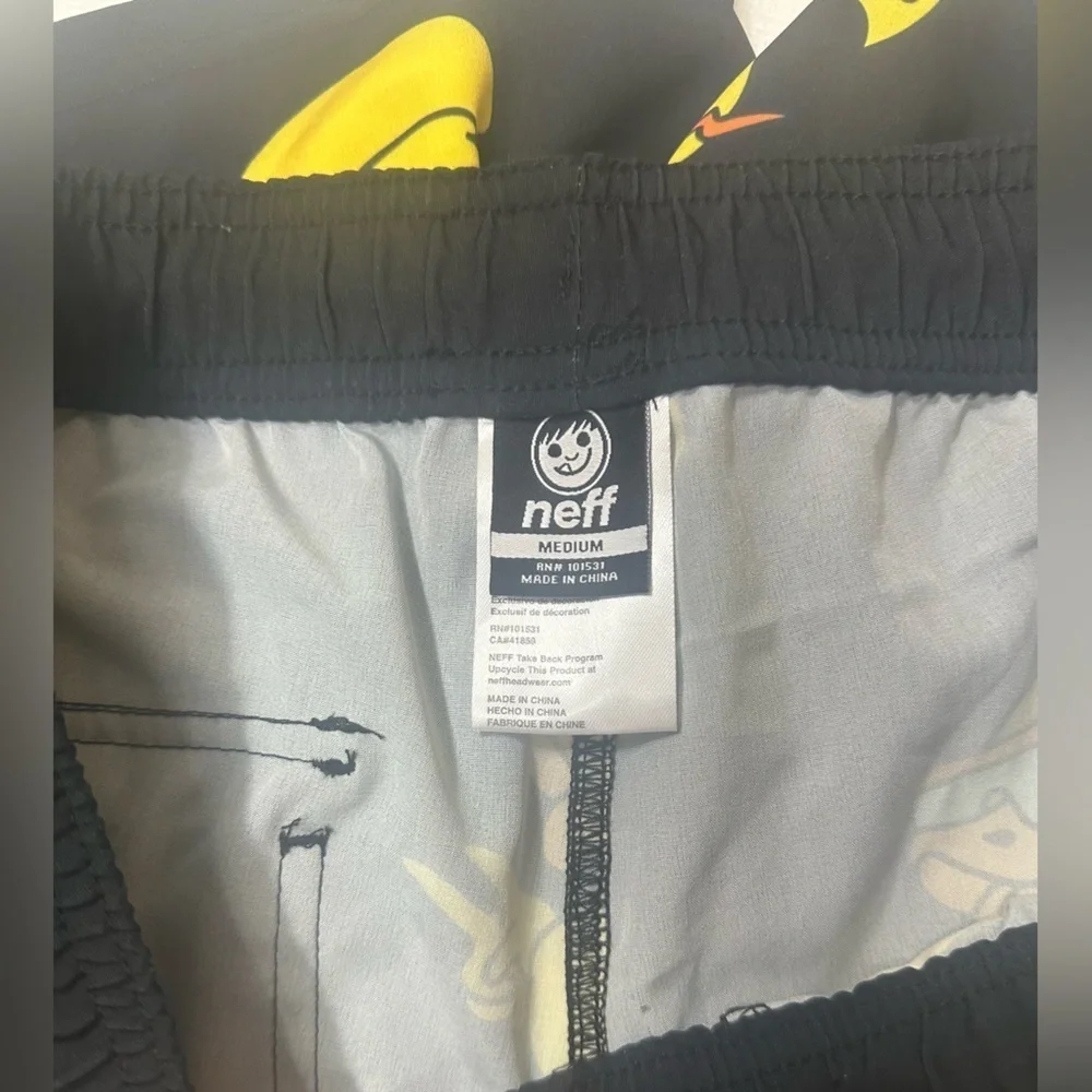 NWOT Neff Black and Yellow Duck Print Swim Trunks